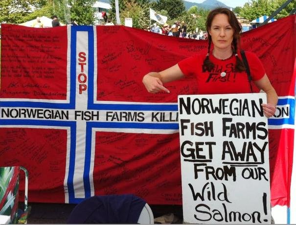 Elena with flag and sign Elena with flag and sign
