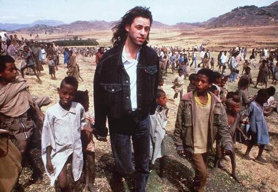 Geldof with African children Geldof with African children