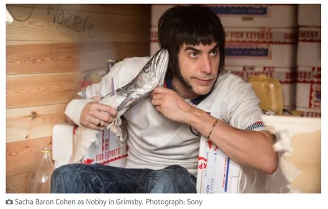 Grim Sacha Baron Cohen in Grimsby with fish